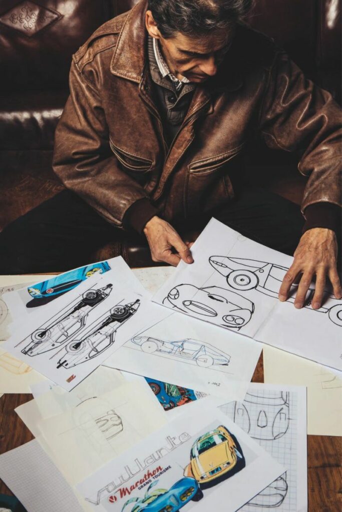 Marcel Sylvand showing his sketches of the Vaillante Le Mans GT